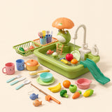 Froggy Wash Station toy sink with its matching tap, umbrella, slide, dishes, play food and fishing accessories on a warm beige background.