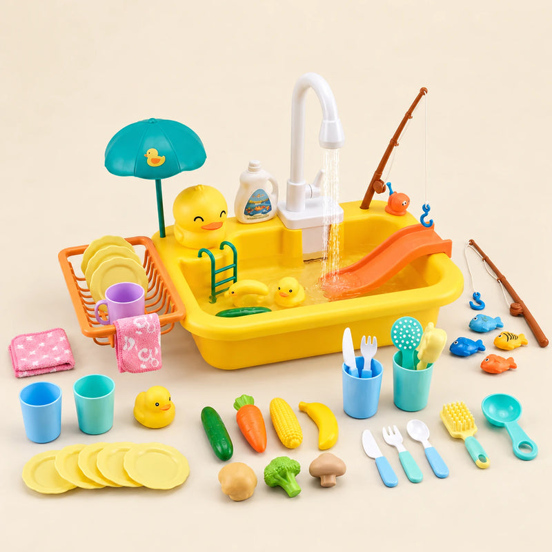Duckling Wash Station toy sink with its matching tap, umbrella, slide, dishes, play food and fishing accessories on a warm beige background.