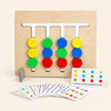 Color Dot Match wooden sliding board with its original discs and pattern cards on warm beige.