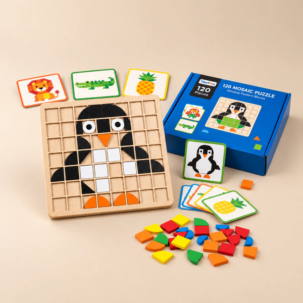 Wooden mosaic grid with a penguin pattern, picture cards, colourful tiles and the blue product box in warm daylight.