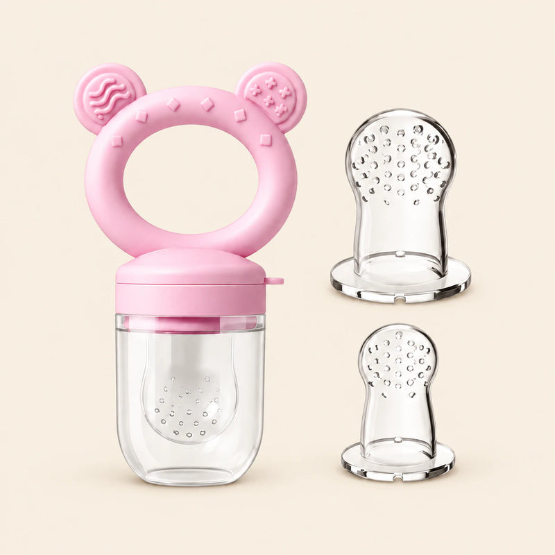 Blush Feeder + Tips showing the ring-handled feeder, clear cover, two extra perforated tips on warm beige.