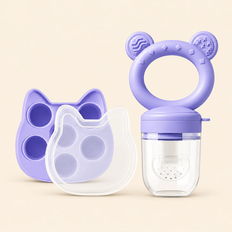 Lavender Feeder + Freezer Tray showing the ring-handled feeder, clear cover, matching cat-shaped tray and clear lid on warm beige.