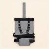 Soft Grey Harness shown alone on warm beige, with the actual product construction preserved.