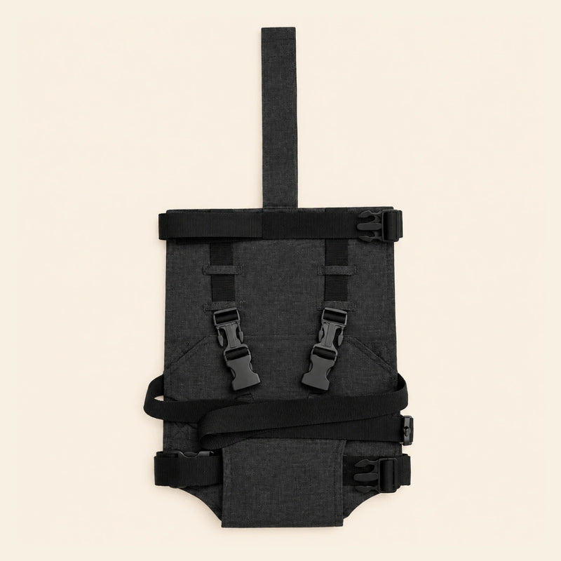 Classic Black Harness shown alone on warm beige, with the actual product construction preserved.