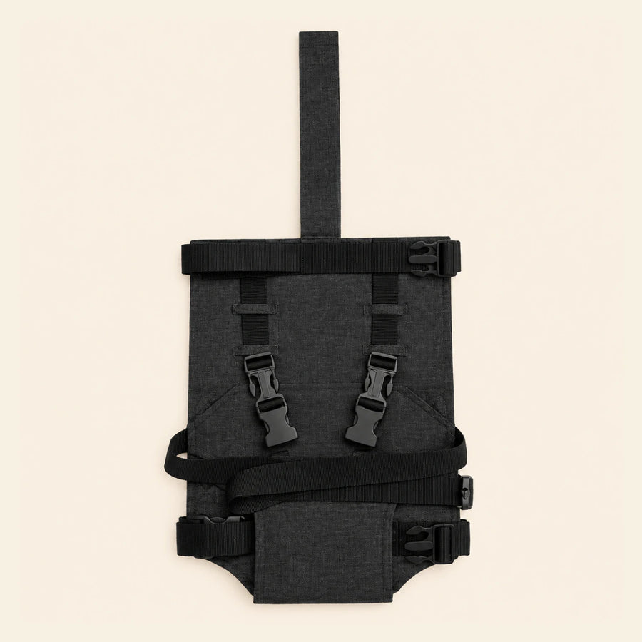 Classic Black Harness shown alone on warm beige, with the actual product construction preserved.