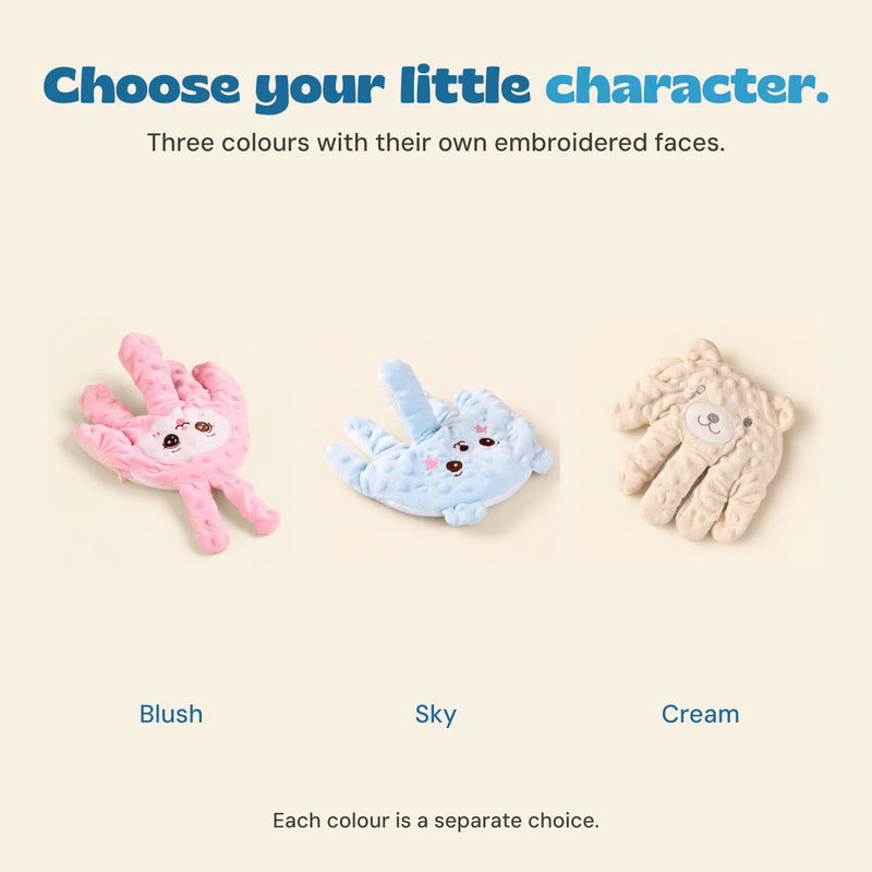 Blush, Sky and Cream hand-shaped plush pillows displayed as separate choices with their distinct embroidered faces.