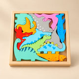 A square wooden tray filled with colourful interlocking dinosaur pieces on a softly lit warm beige studio surface.