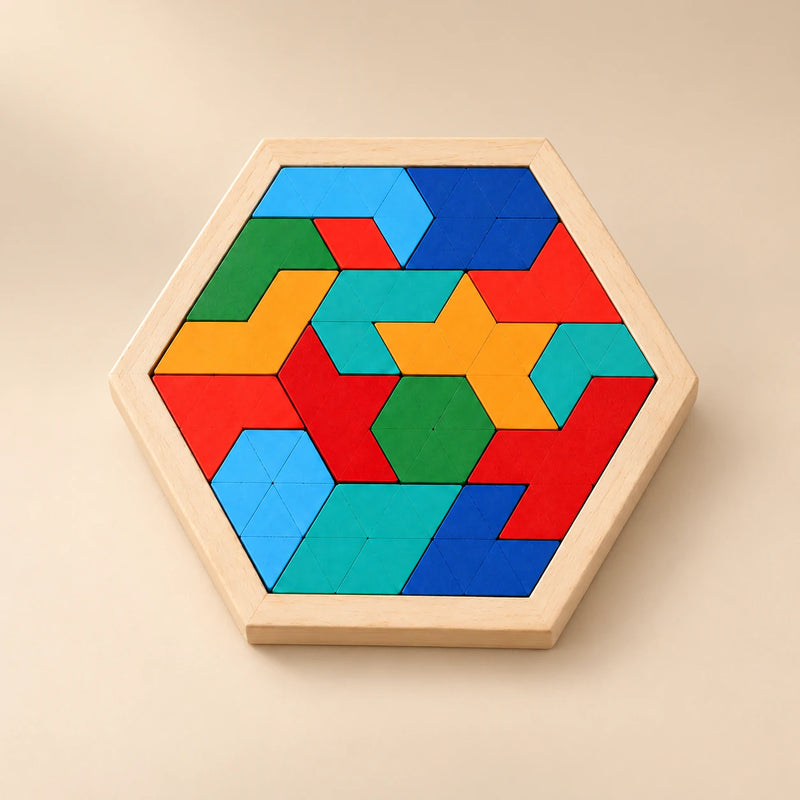 A hexagonal wooden tray of multicoloured angular blocks on a softly sunlit beige surface.