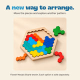 Partly arranged Flower Mosaic Board with three loose green, orange and red grouped pieces beside the wooden tray.