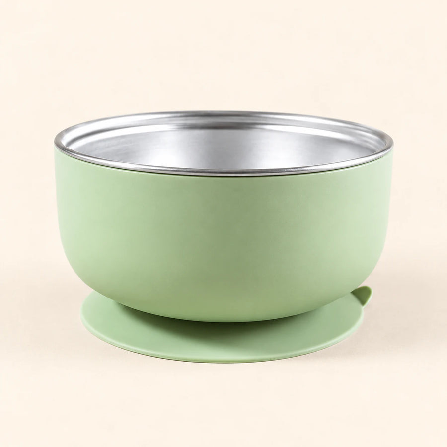 Sage Bear Bowl with a stainless steel interior and round suction base, shown empty on warm beige.