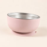 Blush Bear Bowl with a stainless steel interior and round suction base, shown empty on warm beige.