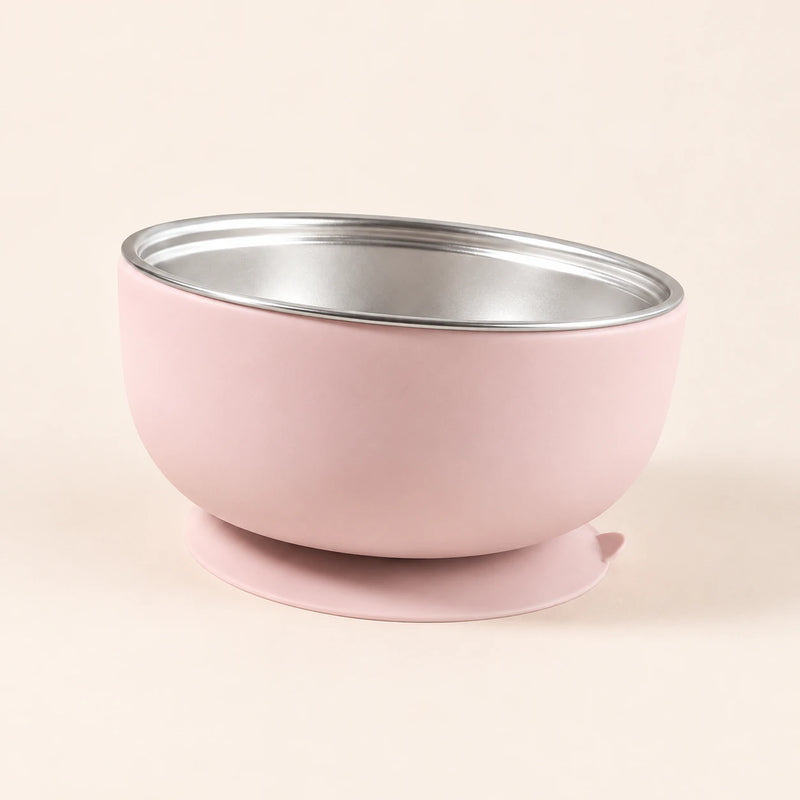 Blush Bear Bowl with a stainless steel interior and round suction base, shown empty on warm beige.