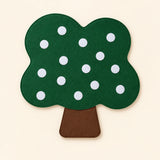 Tree Board Only showing the felt board, white fastening dots and complete silhouette on warm beige. Food pieces are not included in this option.