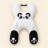 White Panda travel pillow with its original face, wraparound shape, front loops and upper strap on warm beige.