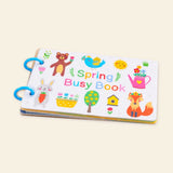 Original Spring Busy Book cover with bear, bird, rabbit, fox, flowers and blue binding rings on warm beige.