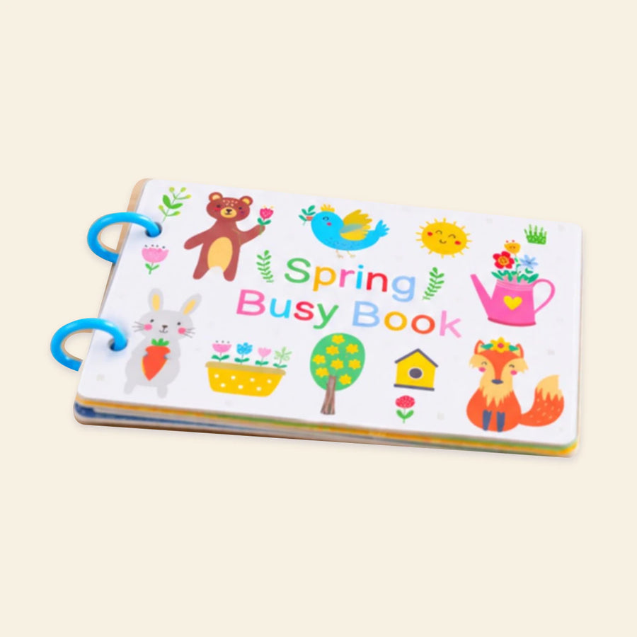 Original Spring Busy Book cover with bear, bird, rabbit, fox, flowers and blue binding rings on warm beige.