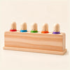 Rainbow Press Toy shown clearly on a smooth warm beige background.