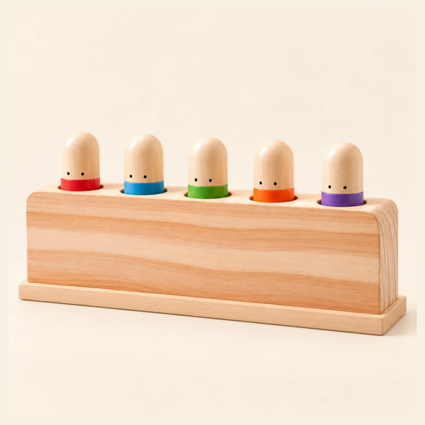 Rainbow Press Toy shown clearly on a smooth warm beige background.