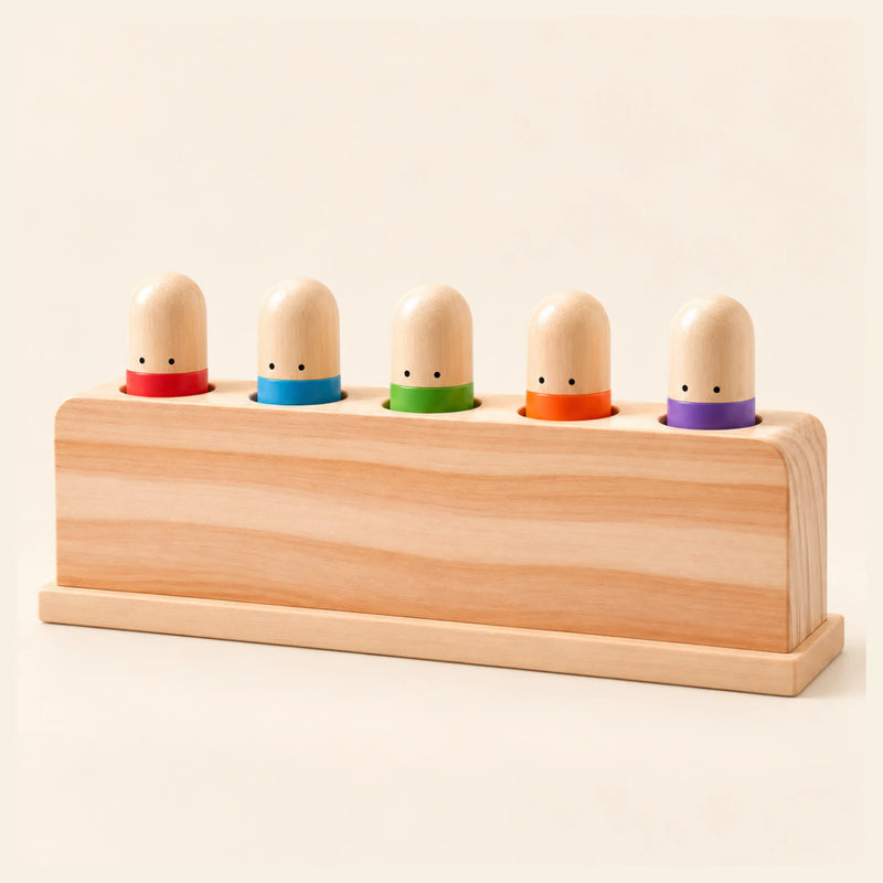 Rainbow Press Toy shown clearly on a smooth warm beige background.