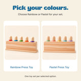 Rainbow and Pastel are separate colour options, each with one wooden base and five pegs.