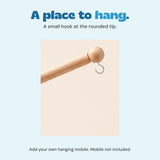 Detail of the rounded wooden end and metal hanging hook, ready for a separately supplied mobile.