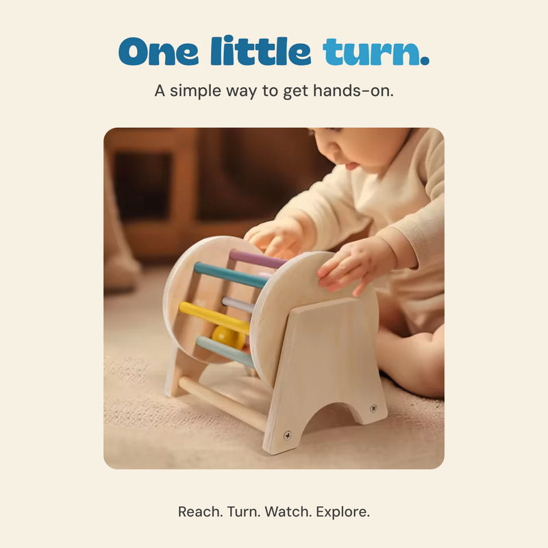 The original product photograph shows a child reaching toward the spinning drum during floor play.
