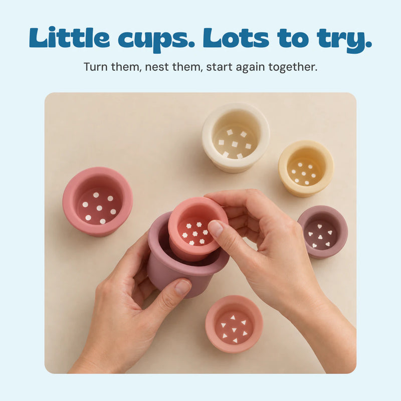 Hands nesting Blush Pastel cups with the other cups beside them